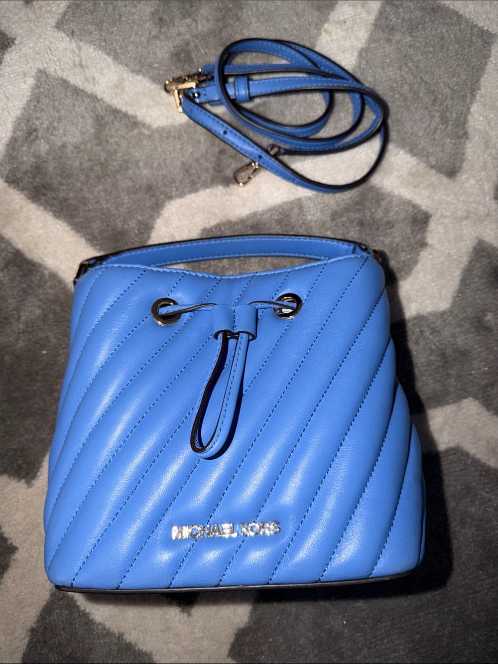 Michael Kors “Suri” Blue Quilted Mini Bucket Bag